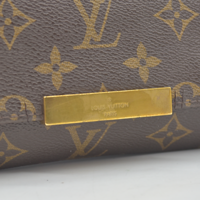 $1490 2015 Louis Vuitton  Monogram Favorite PM FL4145