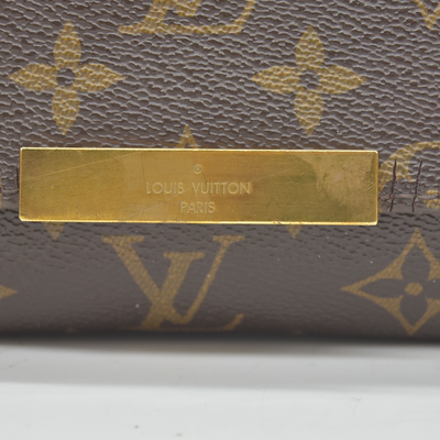 $1490 2015 Louis Vuitton  Monogram Favorite PM FL4145