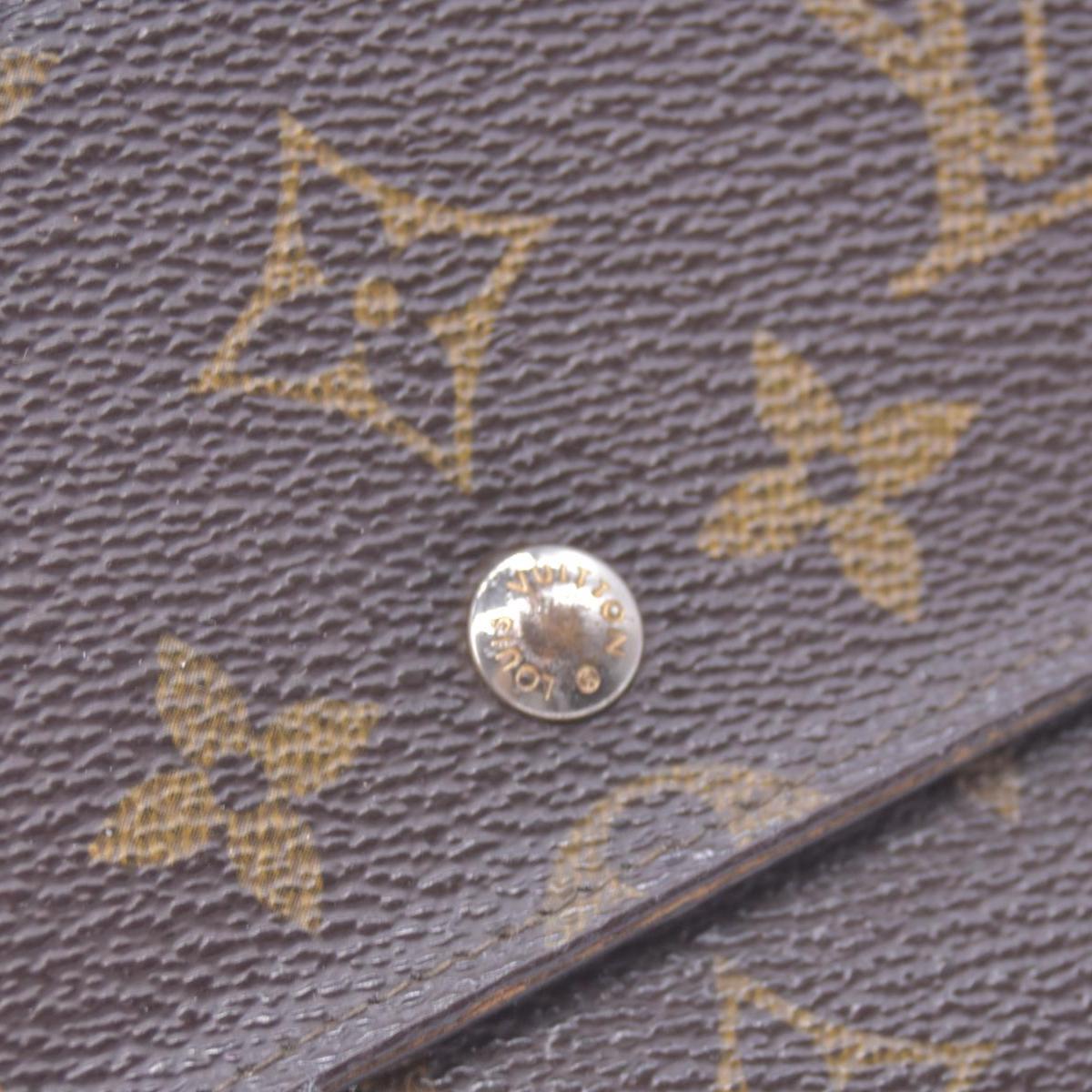 $725 LOUIS VUITTON Monogram Porte-Feuille International Wallet CONSIGNMENT 10021462