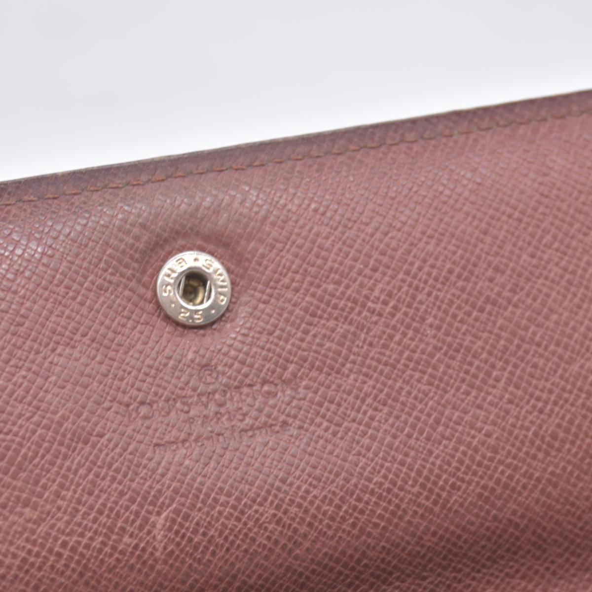$725 LOUIS VUITTON Monogram Porte-Feuille International Wallet CONSIGNMENT 10021462