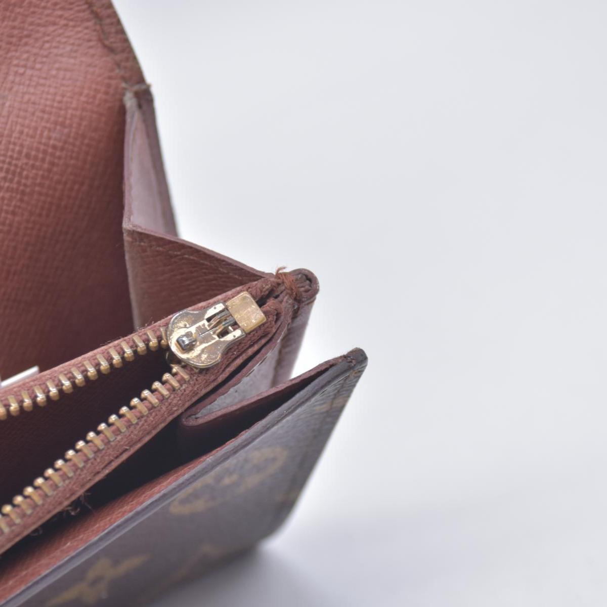 $725 LOUIS VUITTON Monogram Porte-Feuille International Wallet CONSIGNMENT 10021462