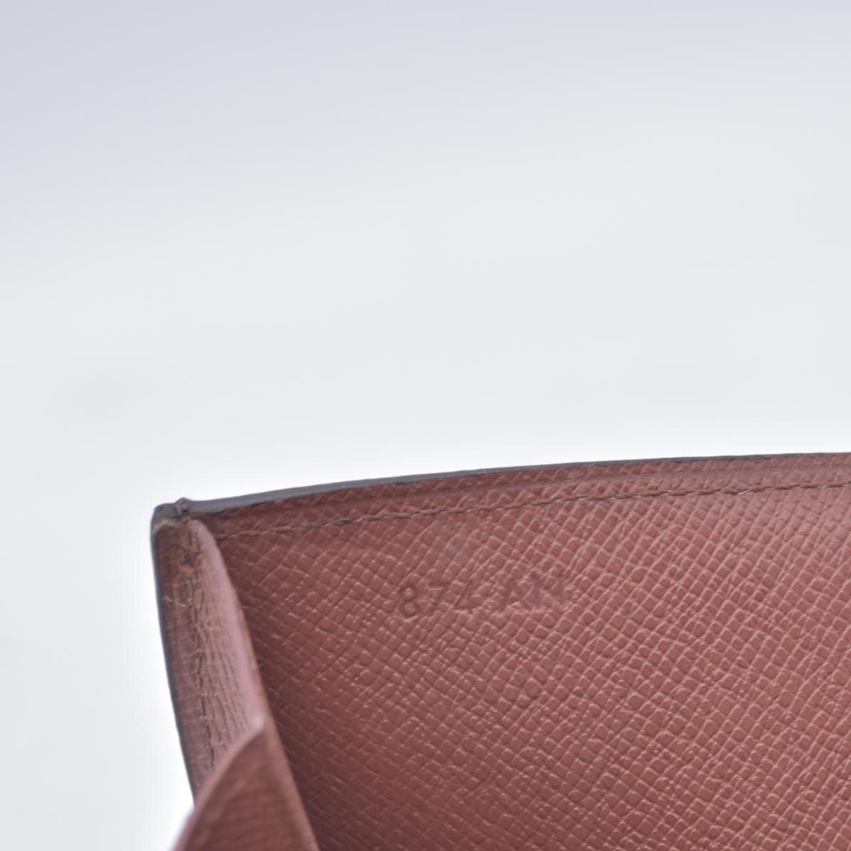 $725 LOUIS VUITTON Monogram Porte-Feuille International Wallet CONSIGNMENT 10021462