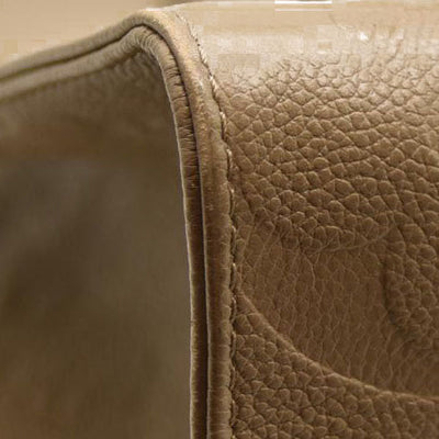 Louis Vuitton  Empreinte Monogram Giant Onthego MM Tourterelle