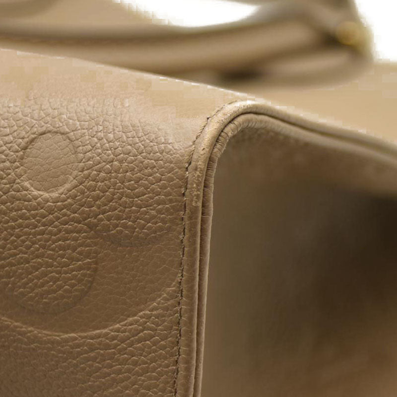 Louis Vuitton  Empreinte Monogram Giant Onthego MM Tourterelle