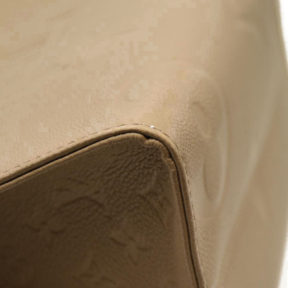 Louis Vuitton  Empreinte Monogram Giant Onthego MM Tourterelle