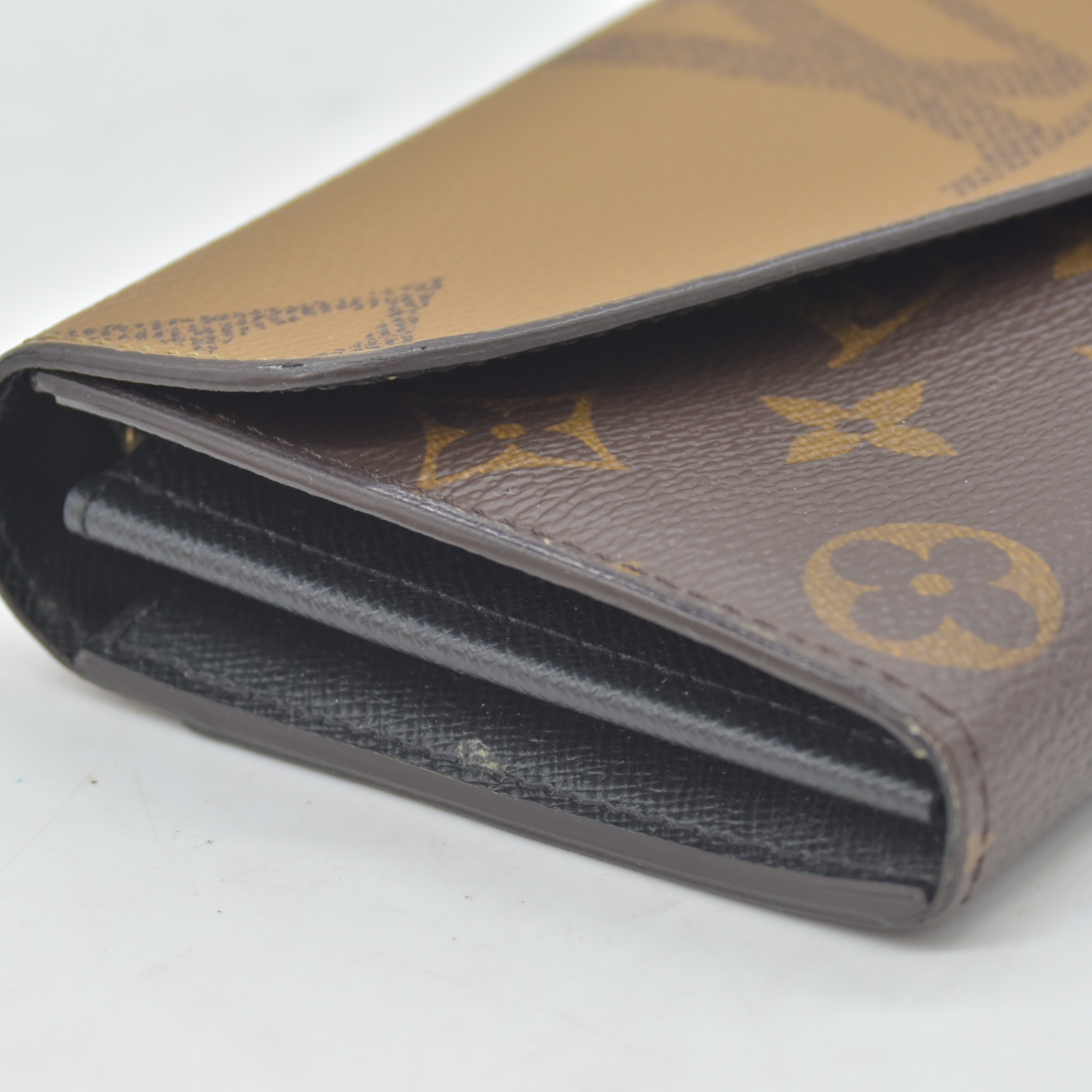 $885 RFID Louis Vuitton Reverse Monogram Giant Sarah Wallet
