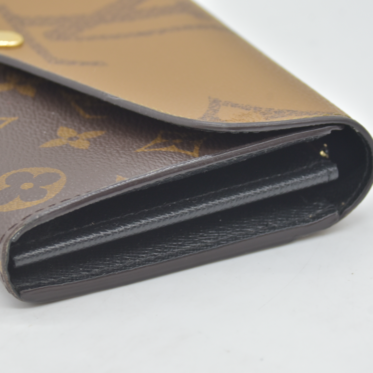 $885 RFID Louis Vuitton Reverse Monogram Giant Sarah Wallet