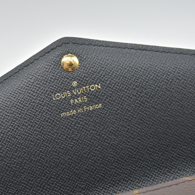 $885 RFID Louis Vuitton Reverse Monogram Giant Sarah Wallet