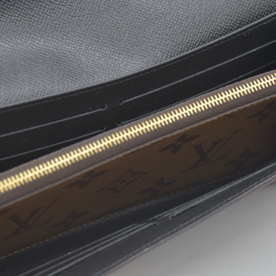 $885 RFID Louis Vuitton Reverse Monogram Giant Sarah Wallet