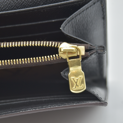 $885 RFID Louis Vuitton Reverse Monogram Giant Sarah Wallet
