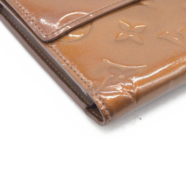 $840 LOUIS VUITTON Monogram Vernis Porte Tresor International Trifold Wallet