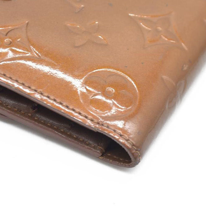 $840 LOUIS VUITTON Monogram Vernis Porte Tresor International Trifold Wallet