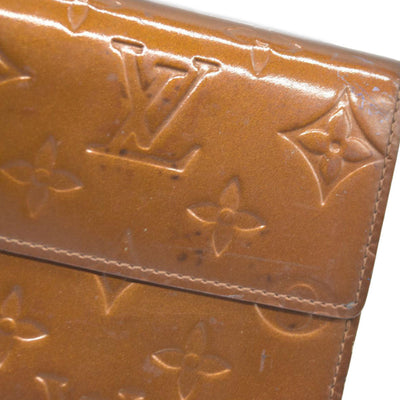 $840 LOUIS VUITTON Monogram Vernis Porte Tresor International Trifold Wallet