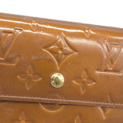 $840 LOUIS VUITTON Monogram Vernis Porte Tresor International Trifold Wallet