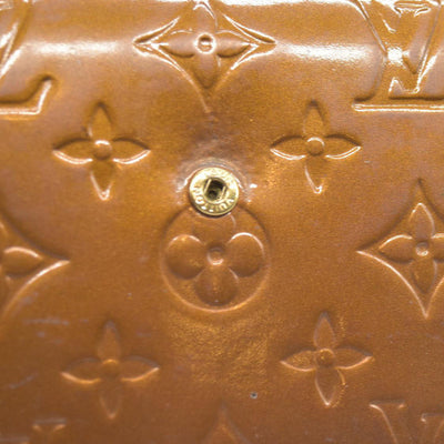 $840 LOUIS VUITTON Monogram Vernis Porte Tresor International Trifold Wallet