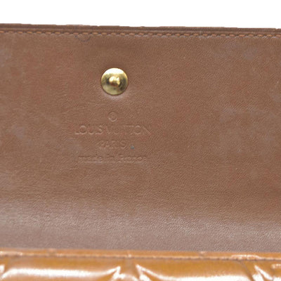 $840 LOUIS VUITTON Monogram Vernis Porte Tresor International Trifold Wallet