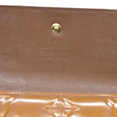 $840 LOUIS VUITTON Monogram Vernis Porte Tresor International Trifold Wallet