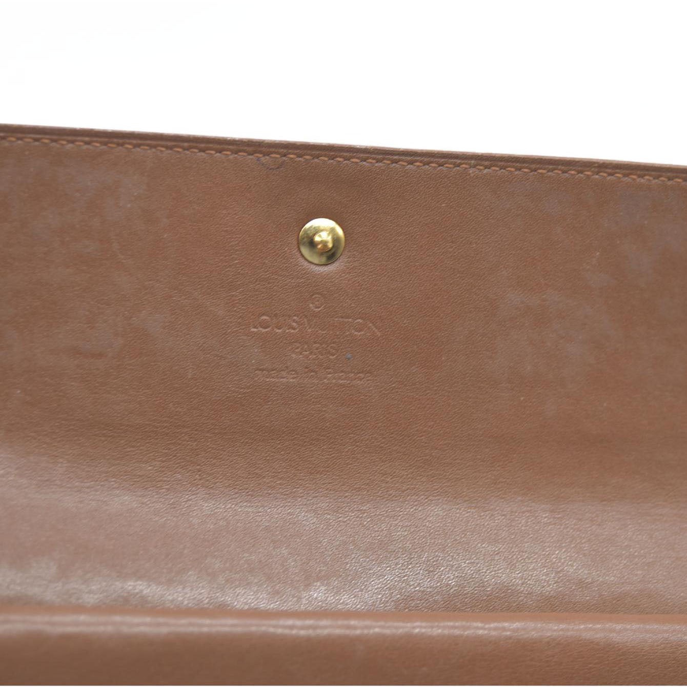 $840 LOUIS VUITTON Monogram Vernis Porte Tresor International Trifold Wallet