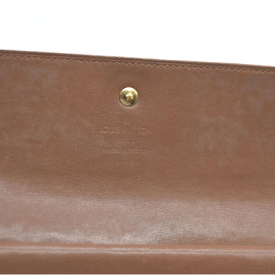 $840 LOUIS VUITTON Monogram Vernis Porte Tresor International Trifold Wallet