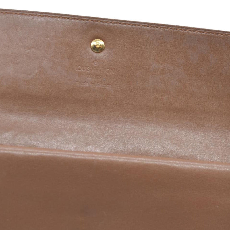 $840 LOUIS VUITTON Monogram Vernis Porte Tresor International Trifold Wallet