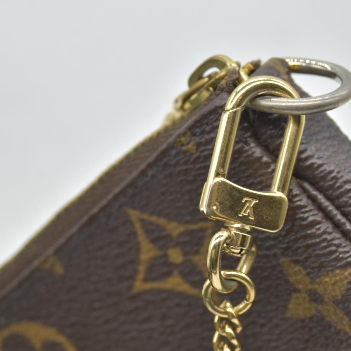 $810 Louis Vuitton Monogram Mini Pochette Accessories