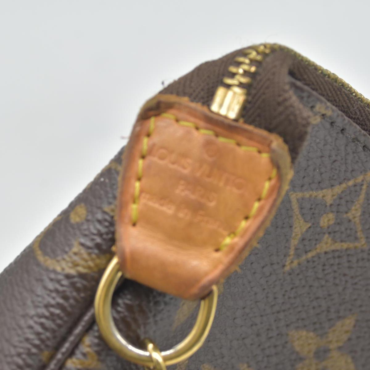 $810 Louis Vuitton Monogram Mini Pochette Accessories