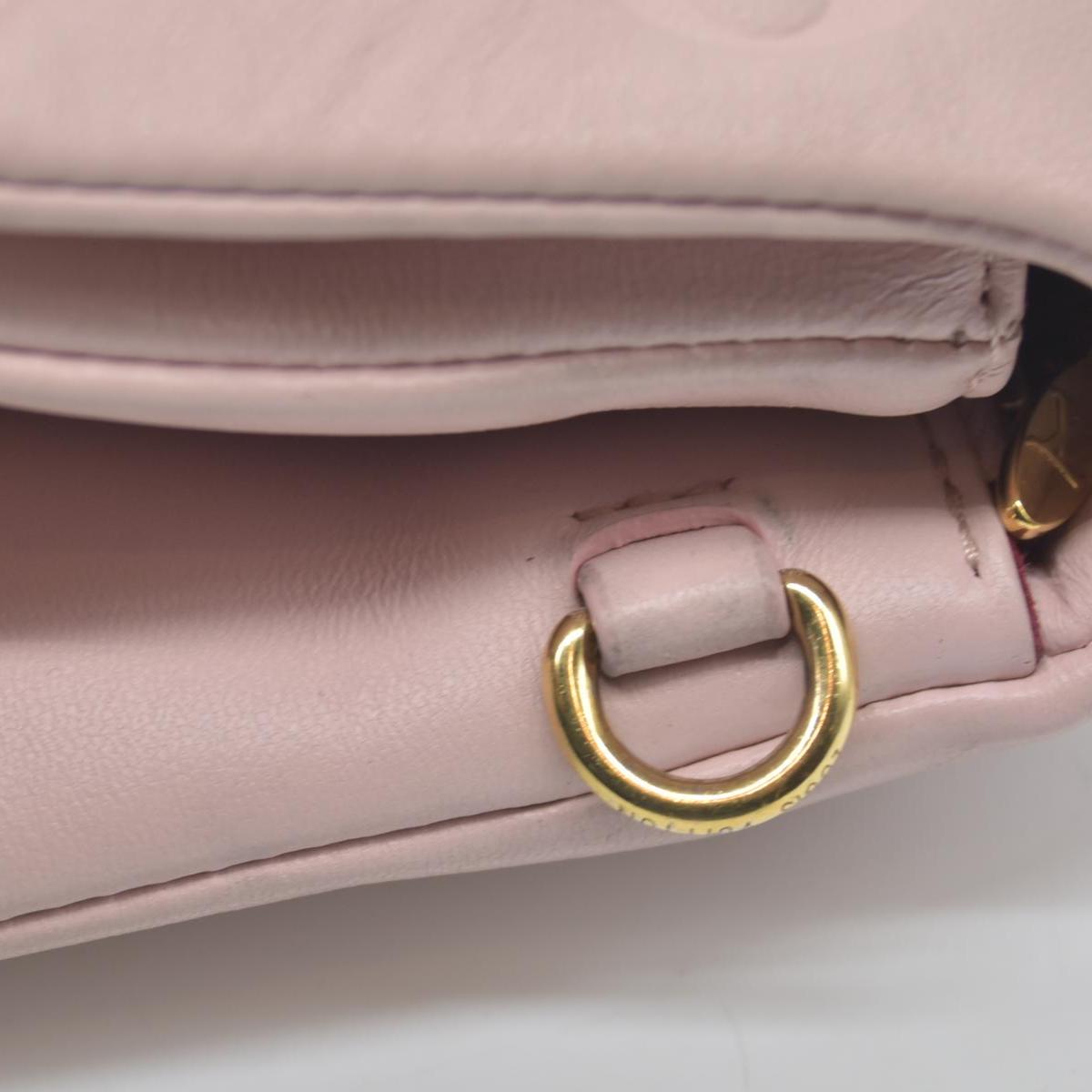 $2840 Louis Vuitton Monogram Embossed Pochette Coussin