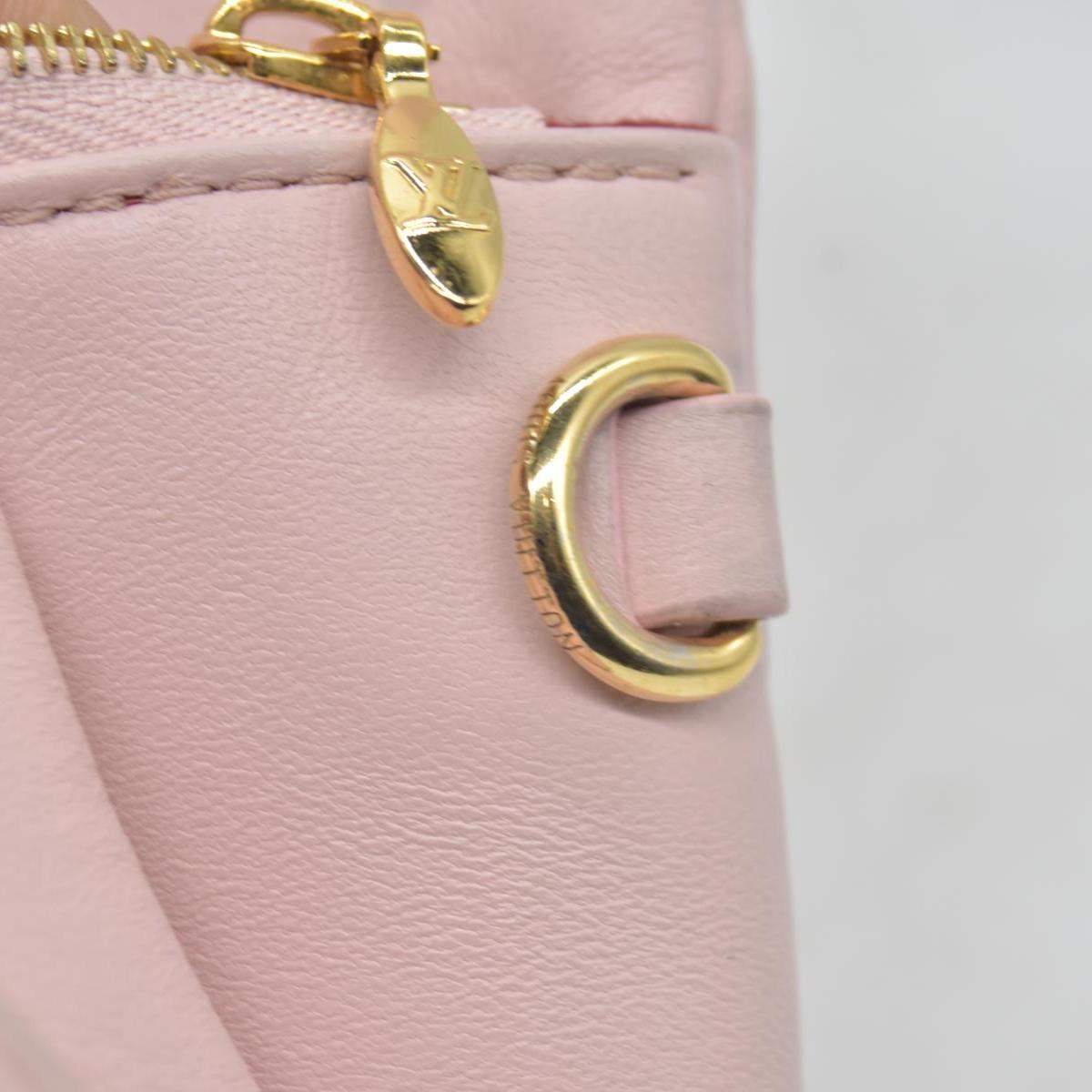 $2840 Louis Vuitton Monogram Embossed Pochette Coussin