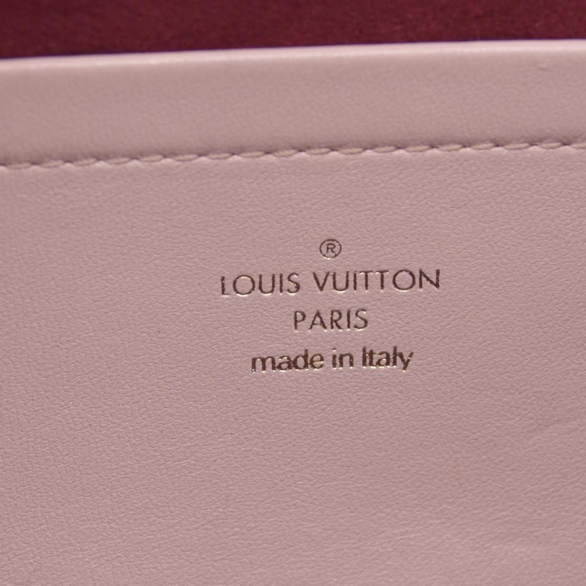 $2840 Louis Vuitton Monogram Embossed Pochette Coussin