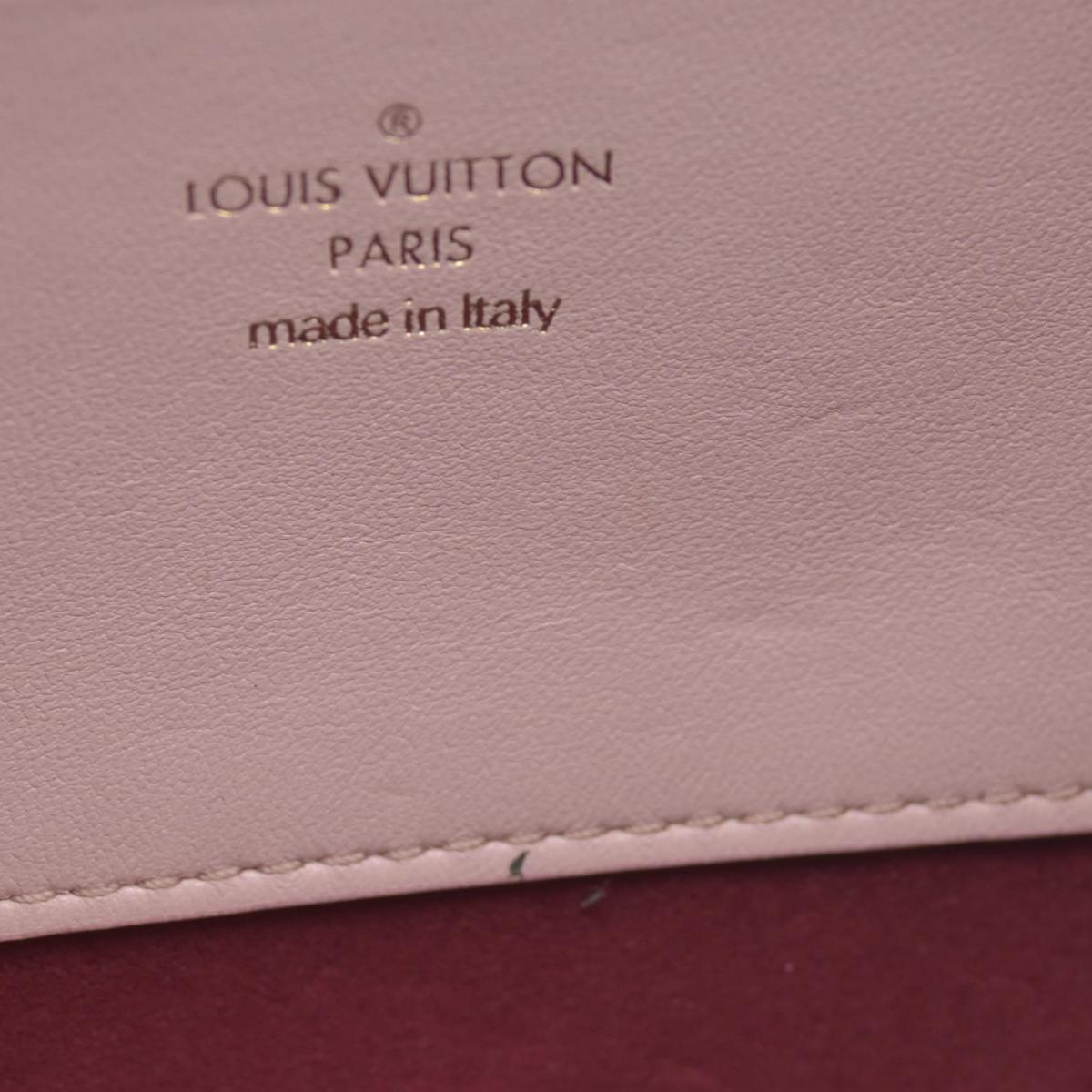 $2840 Louis Vuitton Monogram Embossed Pochette Coussin