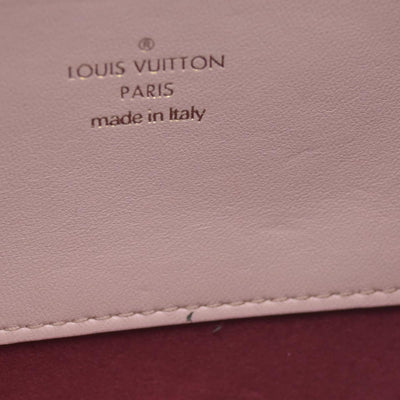 $2840 Louis Vuitton Monogram Embossed Pochette Coussin