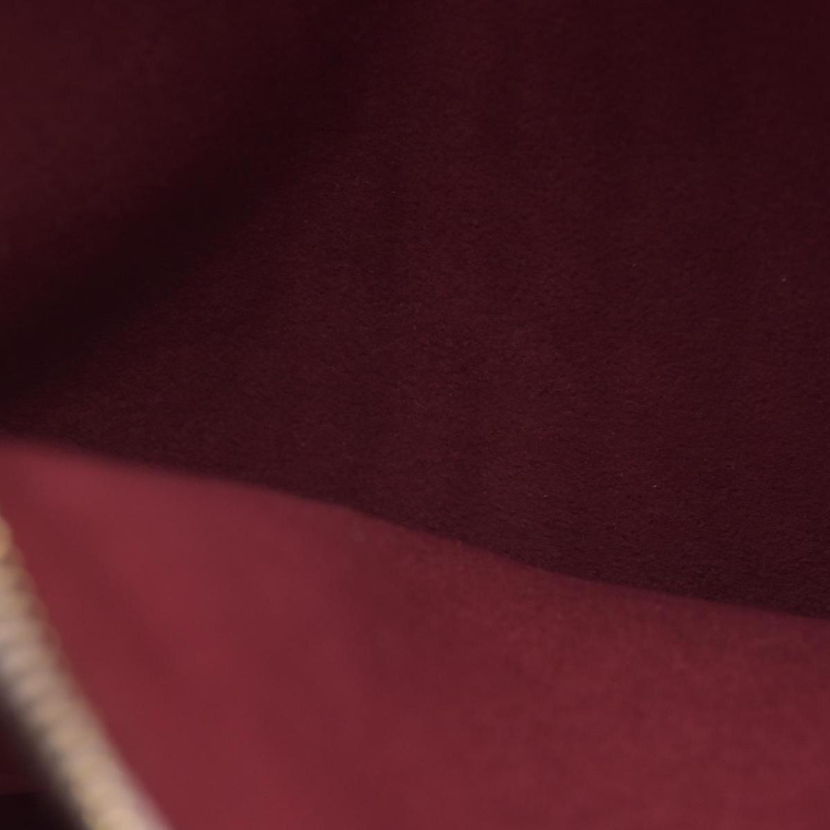 $2840 Louis Vuitton Monogram Embossed Pochette Coussin