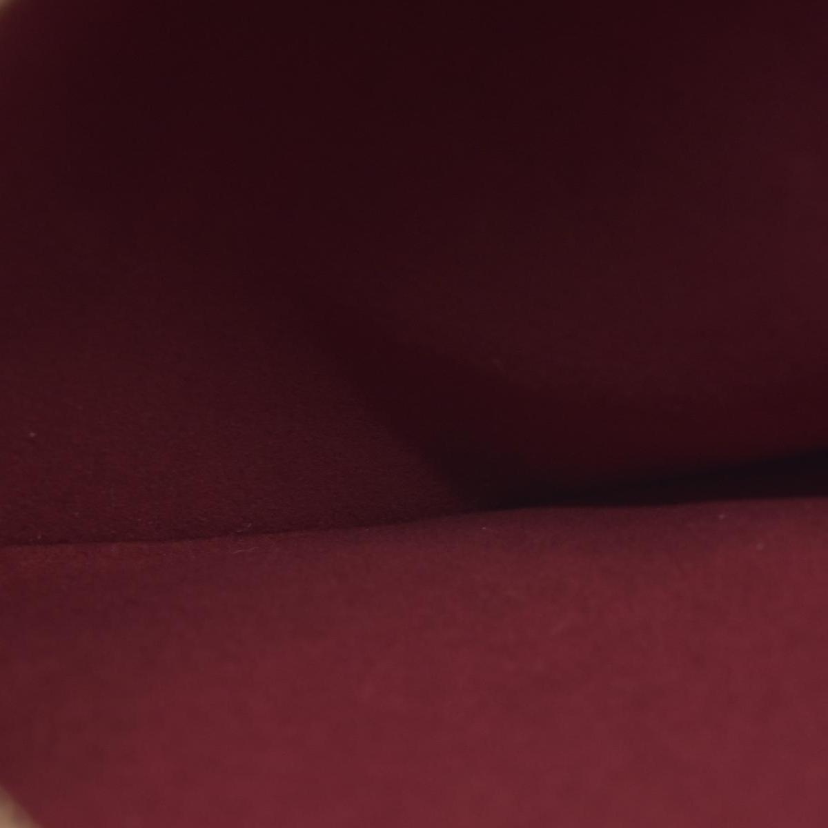 $2840 Louis Vuitton Monogram Embossed Pochette Coussin