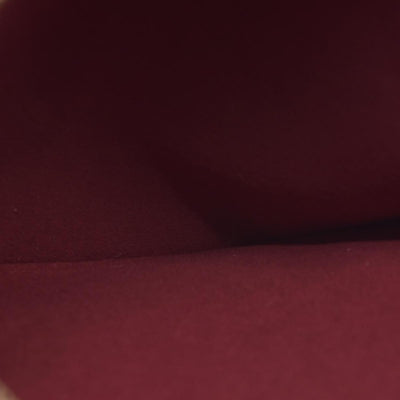 $2840 Louis Vuitton Monogram Embossed Pochette Coussin