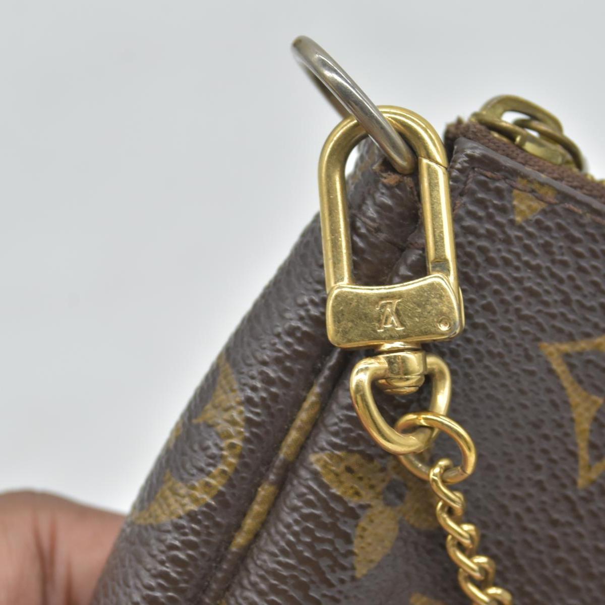$810 Louis Vuitton Monogram Mini Pochette Accessories DU1006 2006