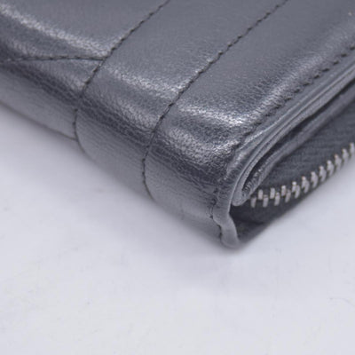 Saint Laurent Calfskin Matelasse Monogram Compact Zip Around Wallet Dark Grey CONSIGNMENT