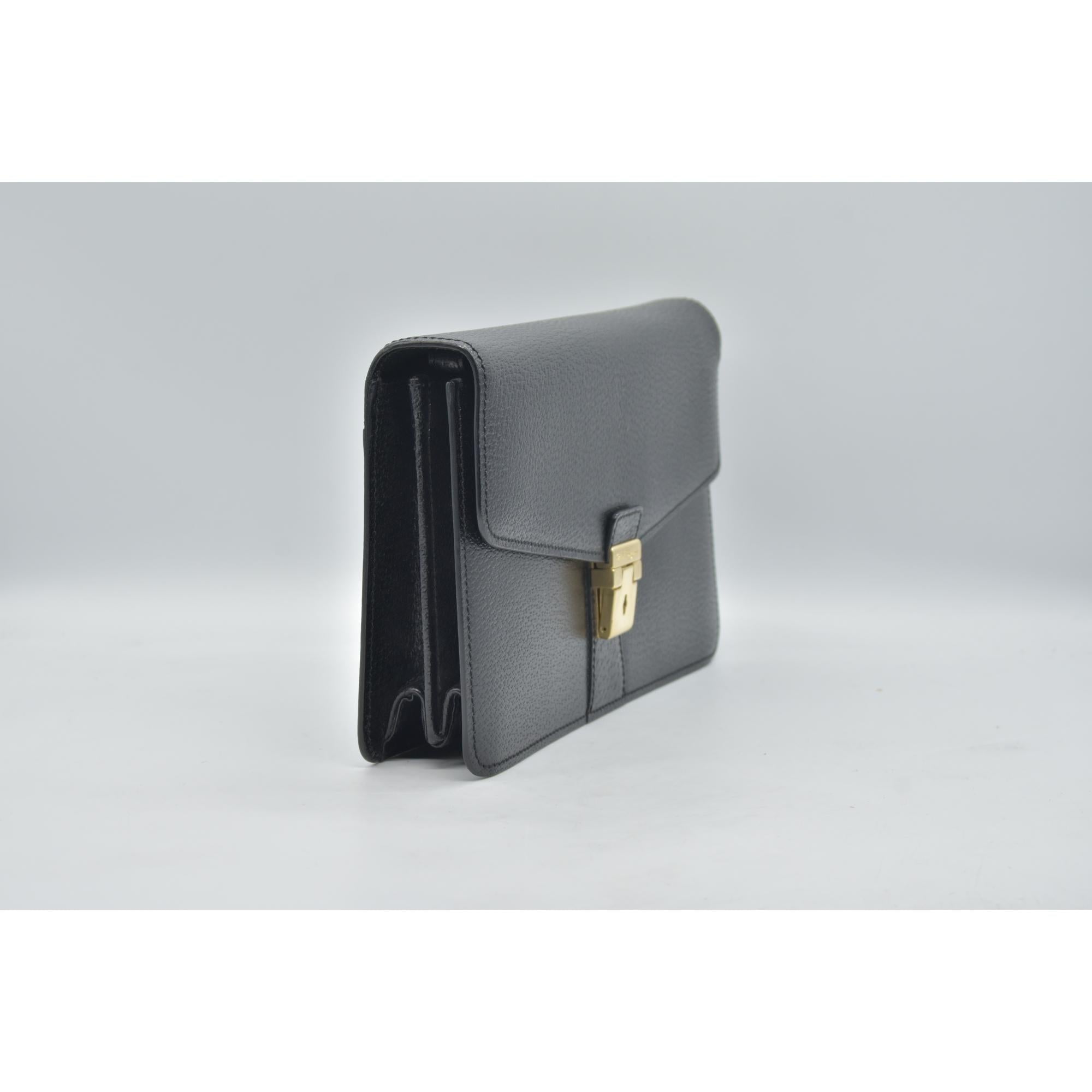 $700 Salvatore Ferragamo  Gancini Clutch CONSIGNMENT