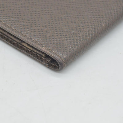 $835 Louis Vuitton Taiga Brown Leather Bifold Wallet CONSIGNMENT