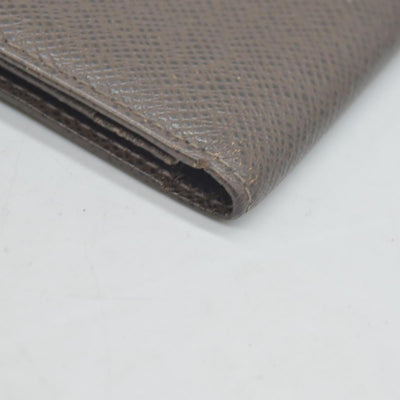 $835 Louis Vuitton Taiga Brown Leather Bifold Wallet CONSIGNMENT