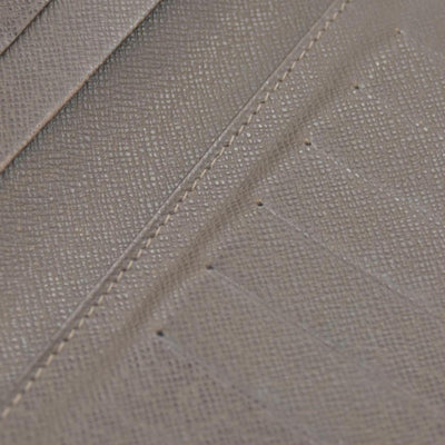 $835 Louis Vuitton Taiga Brown Leather Bifold Wallet CONSIGNMENT