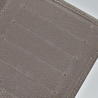 $835 Louis Vuitton Taiga Brown Leather Bifold Wallet CONSIGNMENT