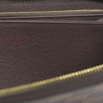 $915 2021 Louis Vuitton  Damier Ebene Zippy Wallet MI0231