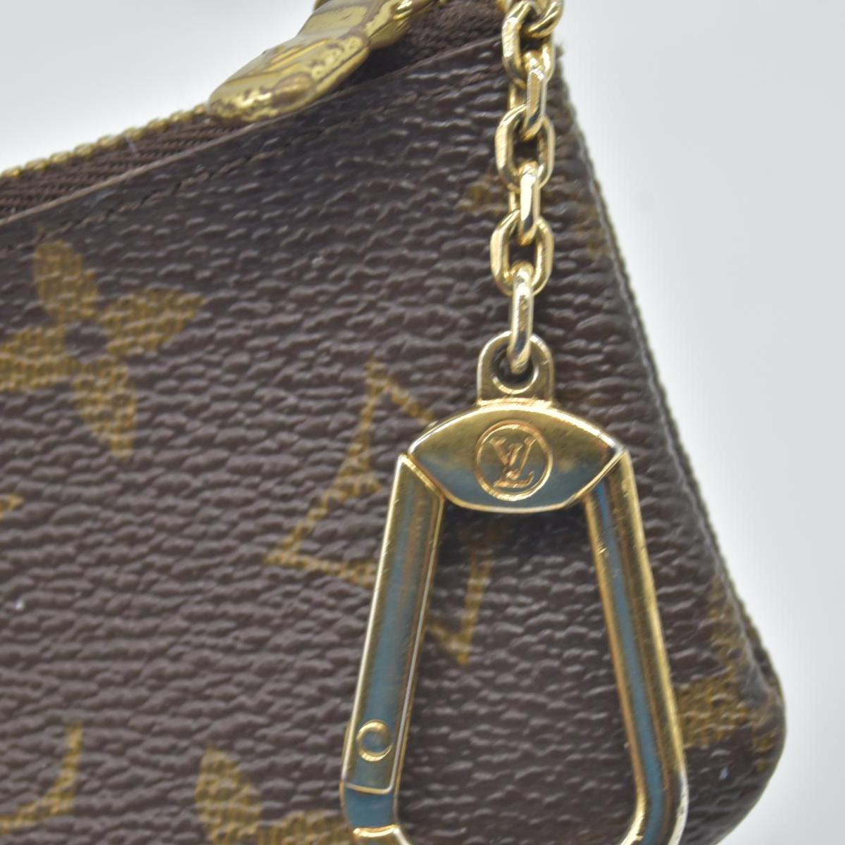 $345  Louis Vuitton  Monogram Key Pouch