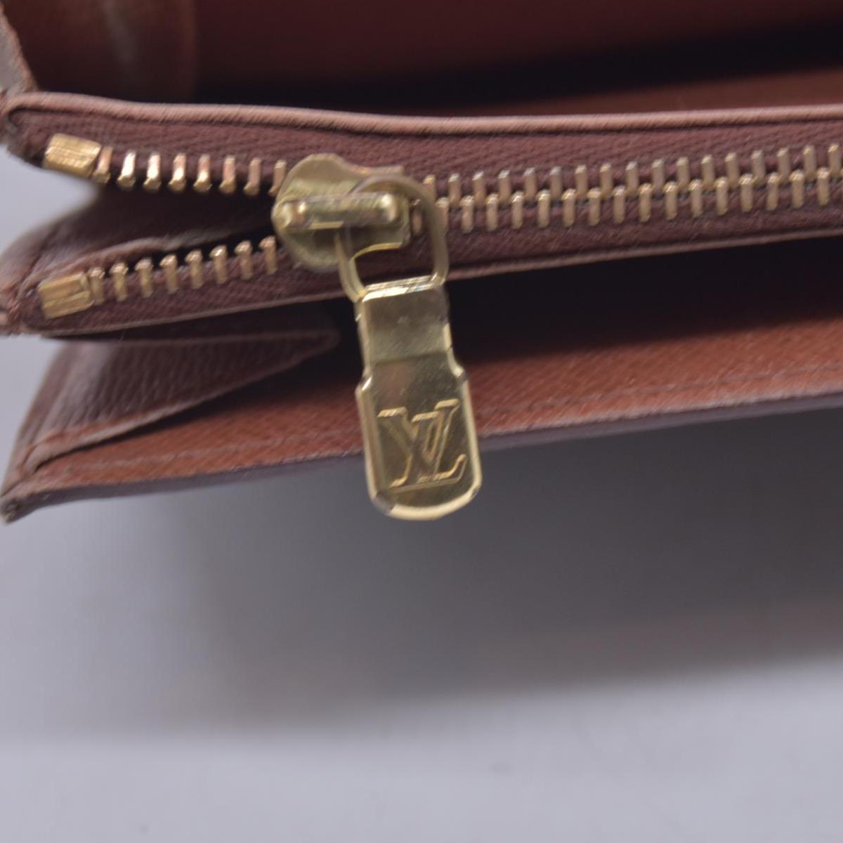 $720 LOUIS VUITTON Monogram Portefeuille International Wallet Brown CONSIGNMENT 10021580