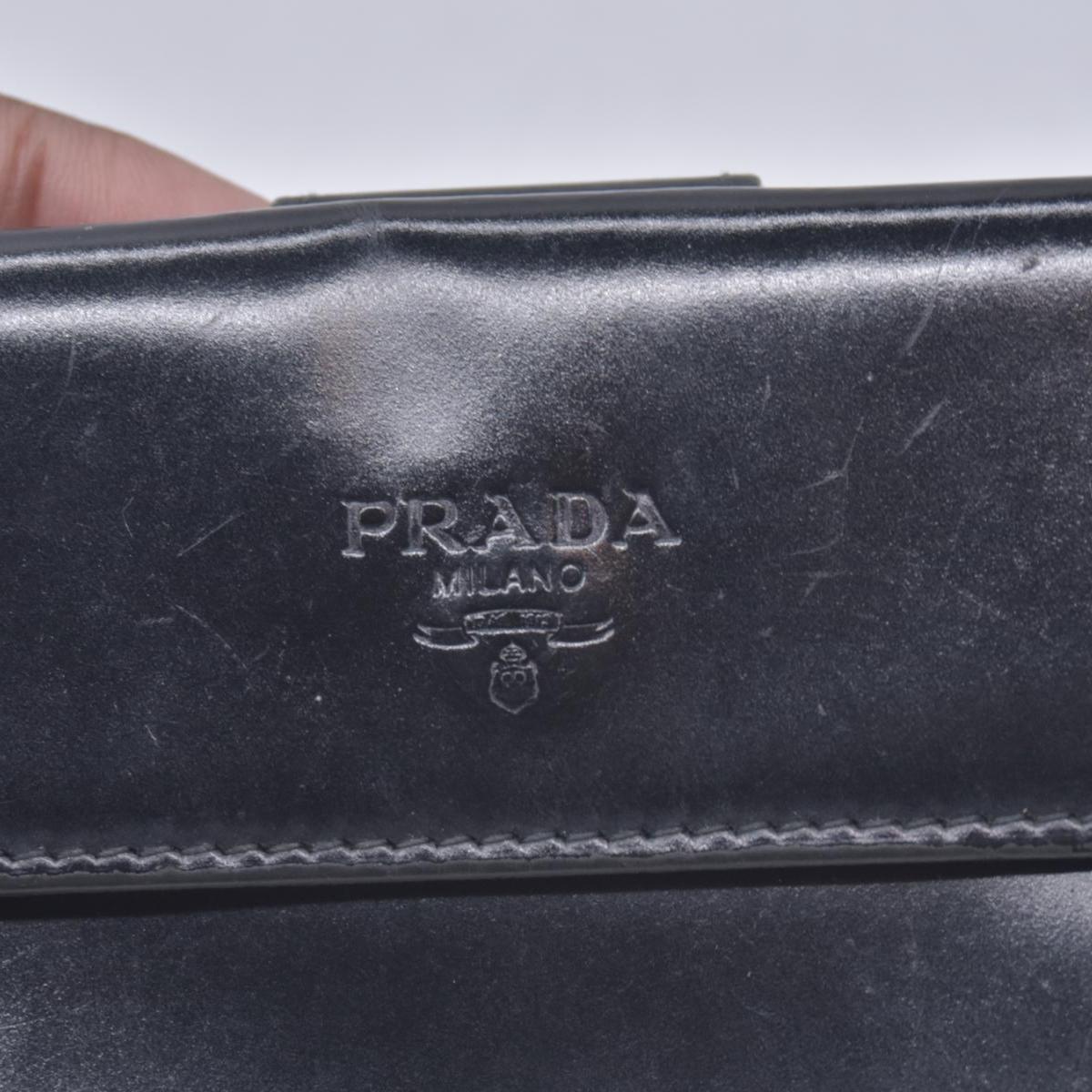$520 PRADA Spazzolato Embossed Logo Flap Compact Wallet Navy Blue CONSIGNMENT 10021596