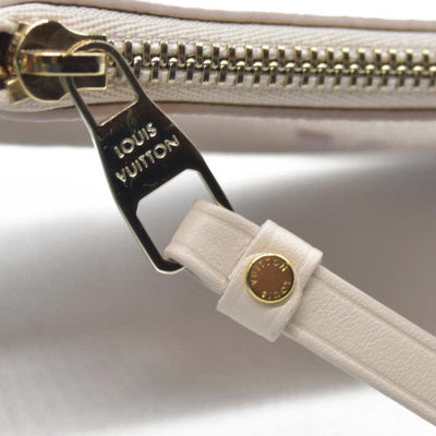 $625 Louis Vuitton  Empreinte Monogram Giant Key Pouch Dream Beige