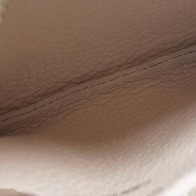 $625 Louis Vuitton  Empreinte Monogram Giant Key Pouch Dream Beige