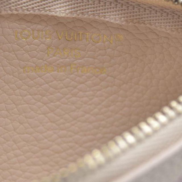 $625 Louis Vuitton  Empreinte Monogram Giant Key Pouch Dream Beige