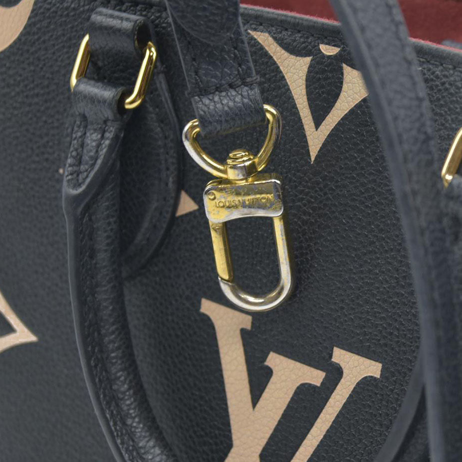 AUCTION $3550 Louis Vuitton Bicolor Monogram Empreinte Leather Onthego PM RFID
