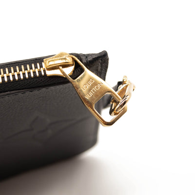 LOUIS VUITTON Empreinte Monogram Giant Neverfull MM Pochette Black Wristlet